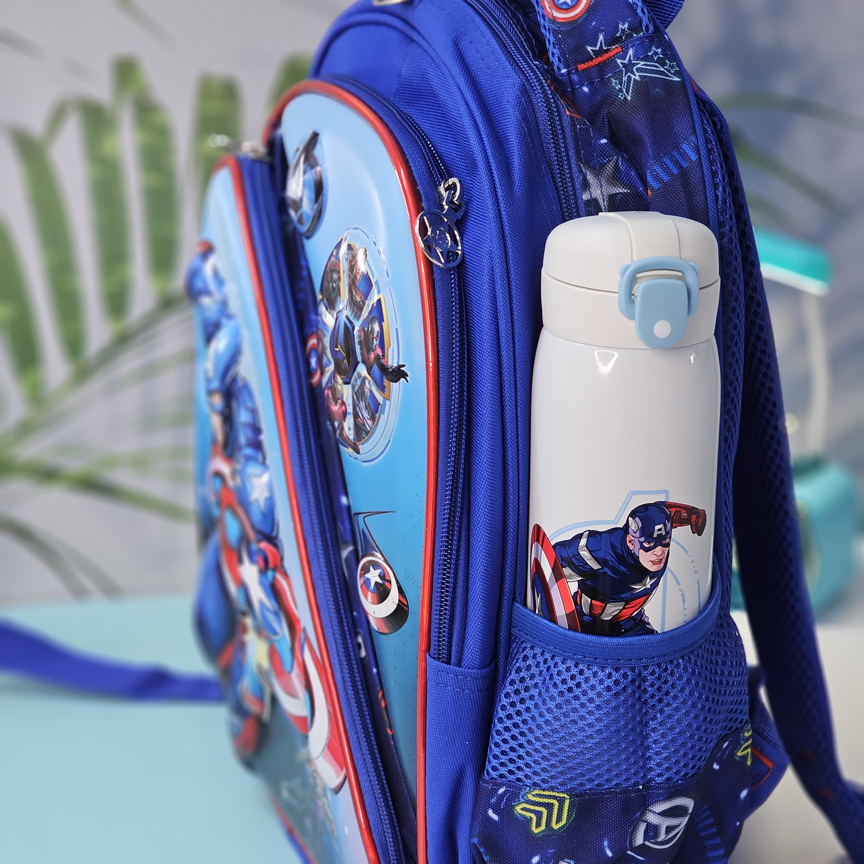 Front view of an Usmile Toys superhero backpack for kids, displaying detailed illustrations of Iron Man and other Avengers characters, suitable for school or travel." www.usmile.toys